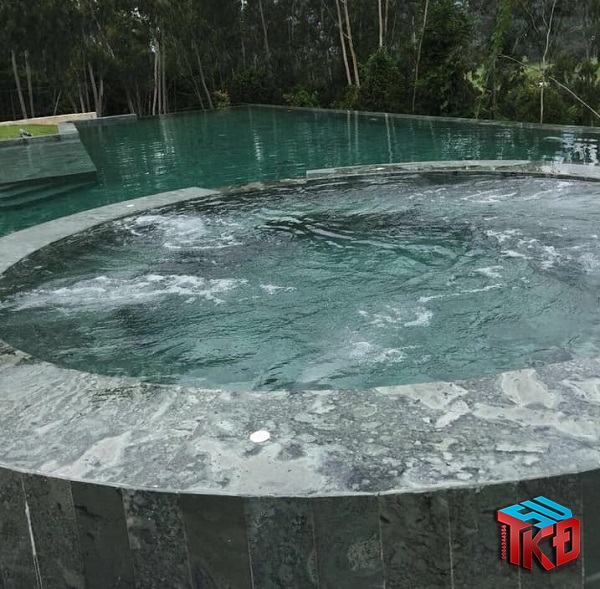 công trình bể bơi hoàn thiện sử dụng đá xanh rêu mài hone